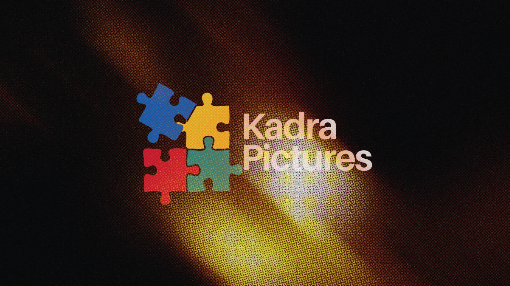 Kadra Pictures logo lit by a warm halftone light beam